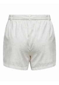 Shorts en coton blancs avec une taille élastique, ornés d'un motif brodé de petits designs floraux sur l'ensemble du tissu.