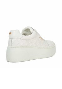 White platform sneaker with a quilted texture, smooth leather finish, and a subtle gold logo accent on the side. Rounded toe design.
