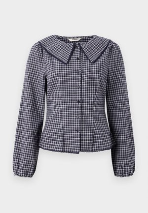 Marineblauwe en witte geblokte blouse met een grote kraag, lange mouwen, knoopsluiting aan de voorkant en een gerimpelde taille. Kenmerkt zich door een golvende zoom en details.