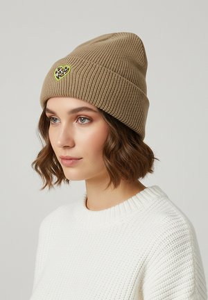 Brown ribbed knit beanie featuring a heart patch with a leopard print and neon green outline, positioned closely on a light background.