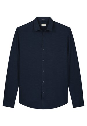 Mørk navy langærmet skjorte i et struktureret stof. Har krave med knapper, frontplade med knapper og et diskret logo på brystet.