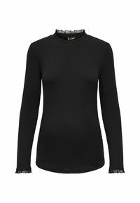 Svart långärmad topp i en figurnära design. Har en volangkrage och volanger vid ärmsluten, tillverkad i ett mjukt, stretchigt tyg med ribbat mönster.