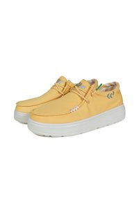 Yellow fabric shoes with white rubber soles, stitched detailing, and an embroidered logo. Interior features a striped pattern in complementary colors.