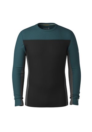 Långärmad skjorta i teal och svart med en sömlös design, som har en rund halsringning och kontrasterande grå sidopaneler.