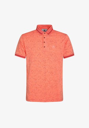 Polo shirt in vibrant coral, short sleeves, with a ribbed collar and three-button placket. Features a textured pattern throughout.