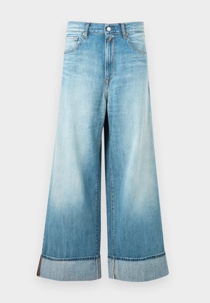 Lyseblå vidbente jeans i denim med oppbrettede kanter, fem lommer og knapp- og glidelåslukking.