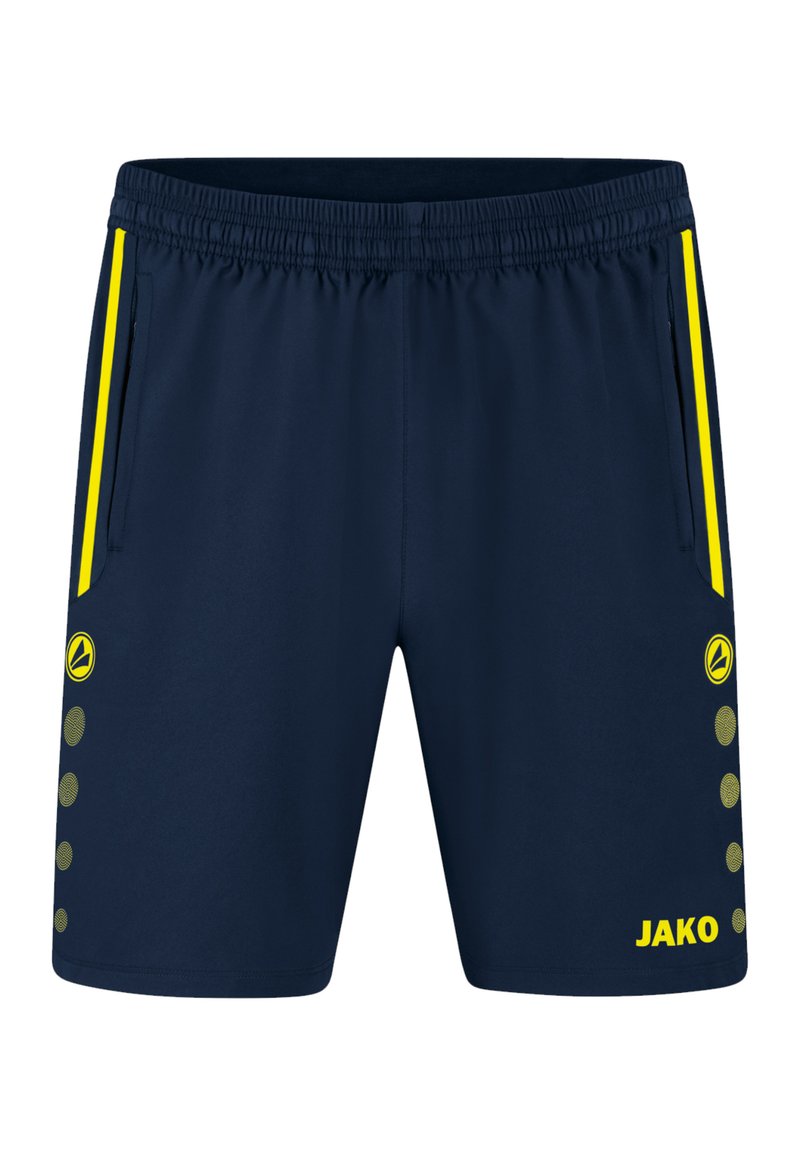 Marinefarbene Sportshorts mit elastischem Bund, Seitentaschen, gelben Akzenten und kreisförmigem Muster am Saum. Branding "JAKO" in Gelb.