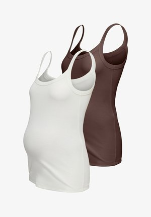 Dva těhotenská tílka s tenkými ramínky, jedno bílé a jedno hnědé, zobrazená na jednobarevném pozadí.