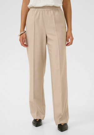 - Spodnie materiałowe