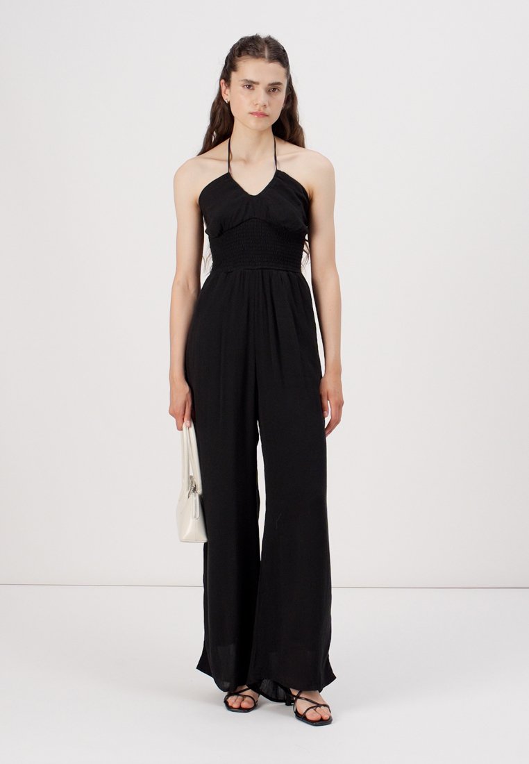 MULTI WAY STRAPLESS SMOCKED WAIST JUMPSUIT - Jumpsuit - Product