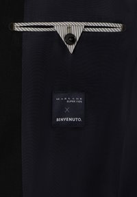 Navy fabric with a label reading "MARLANE SUPER 110'S" and "BENVENUTO." Includes a triangular striped accent and a black button.