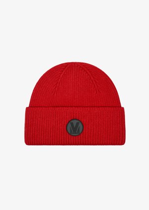 Red ribbed knit beanie featuring a folded cuff and a circular black logo patch with a letter "M" on the front. Soft texture, warm material.