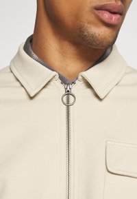 Anerkjendt Sudadera con cremallera - beige