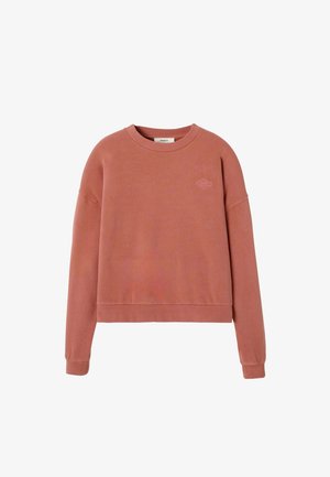 Sweat-shirt court à manches longues couleur rose poussière, en tissu doux, avec un col rond et un logo discret brodé sur la poitrine.