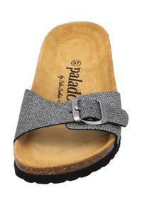 Gray textured slide sandal with adjustable buckle, tan cork footbed, black rubber sole, and printed logo on the insole.