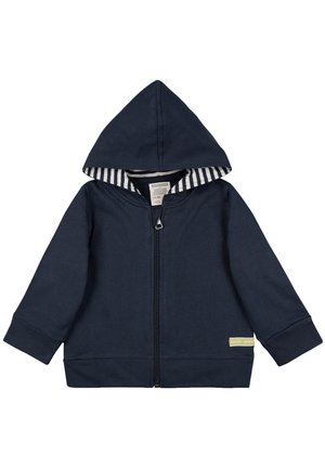 Navyblaue Kapuzenjacke mit Reißverschluss und gefütterter Kapuze, die vertikale weiße Streifen aufweist. Weicher Stoff mit Kängurutaschen und gerippten Bündchen.