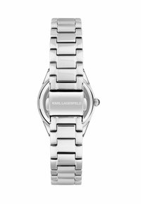 Silverfärgad metallklocka med ett länkat armband som design. Klockans urtavla är rund och har varumärkesnamnet "KARL LAGERFELD" tydligt.