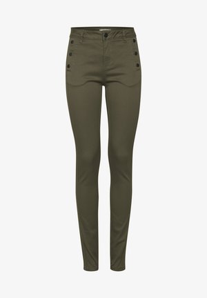 Žali siauri džinsai pagaminti iš elastingos medžiagos su glotnia tekstūra, turintys aukštą juosmenį, priekinės kišenės ir dvi juodos sagos akcentai.