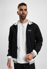 UNFAIR ATHLETICS Sweatjakke - black