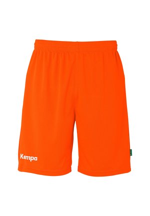 Bright orange athletic shorts with elastic waistband and white "Kempa" logo on left leg.