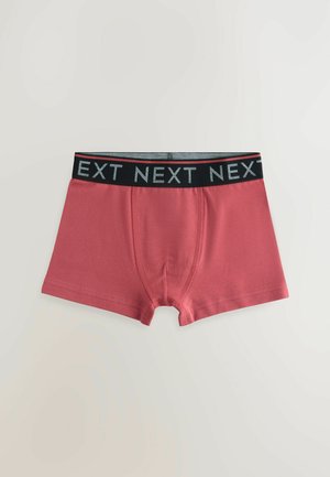 Röda boxershorts med en snug passform, med en svart midjeband märkts "NEXT" i grå text. Slät textur och sömnadsdetaljer.
