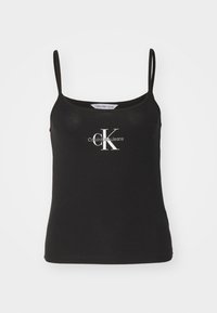 Black cotton tank top with thin straps. Features a white "CK" logo and "Calvin Klein Jeans" text on the front. Smooth texture, casual design.