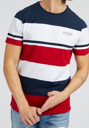 T-shirt à manches courtes pour homme, rayé rouge, blanc et bleu marine. Présente un col rond et le logo de la marque sur la poitrine. Confectionné en coton.