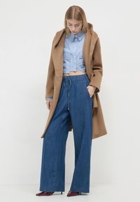 Calliope CON COULISSE - Jeans a zampa - blu denim