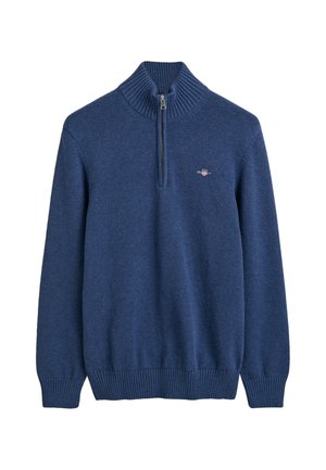 Maglione blu navy con colletto alto a coste e mezza zip. Realizzato in materiale morbido con polsini e orlo a coste, presenta un piccolo logo.