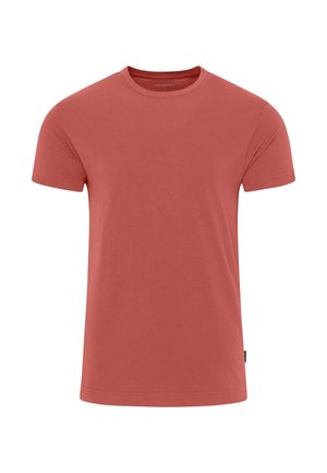 Rød bomulds t-shirt med korte ærmer, rund halsudskæring, glat tekstur og et lille logo mærke på venstre side nederst.