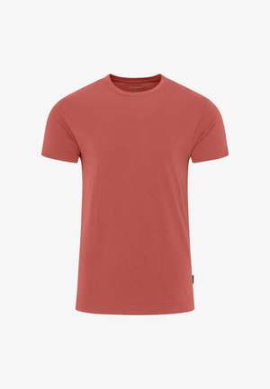 Rød bomulds t-shirt med korte ærmer, rund halsudskæring, glat tekstur og et lille logo mærke på venstre side nederst.