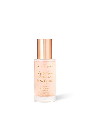Butelka z mgiełką do twarzy Crystallove z kryształowym połyskiem i różowo-złotą nakrętką, zawierająca kojący i uspokajający spray do twarzy z wodą różaną.