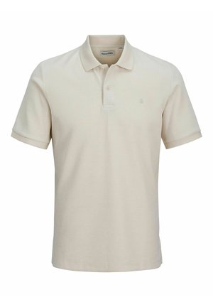 Beige polo skjorte med struktureret vævning, korte ærmer og en tre-knaps lukning. Har et lille logo på brystet.