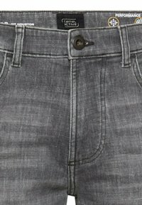 Grijze spijkerbroek van denim met knoopsluiting, lussen voor een riem, voorzakken en zichtbare gestikte naden bij de tailleband en het gulpgebied.