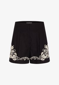 Pantalones cortos negros de talle alto con piernas anchas con bordado floral blanco intrincado a lo largo de los bordes inferiores en ambos lados.