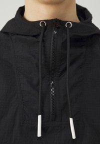 Nike Performance NBA BROOKLYN NETS ANORAK - Vereinsmannschaften - black/white
