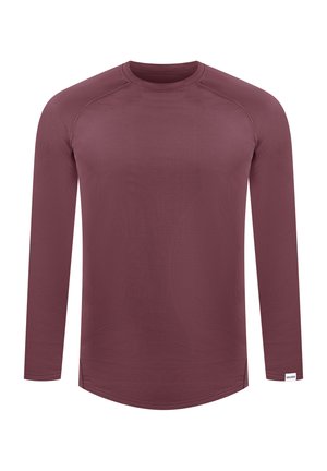 Pitkähihaisen burgundin värisen paidan materiaali on sileä. Paitassa on pyöreä pääntie, raglan-hihat ja huomaamattomat sivusaumakoristukset.
