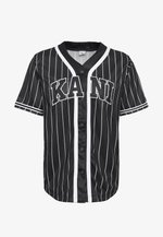 Karl Kani Maillot Baseball Serif Pinstripe Jersey - 100% Coton, Coupe Droite, Manches Courtes, Style Streetwear Urbain