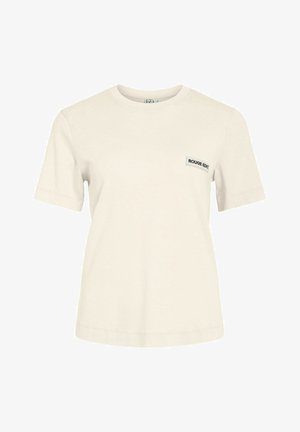 Krém színű, rövid ujjú póló kerek nyakkal, bal mellrészen kis fekete "ROUGE EDIT" felirattal.