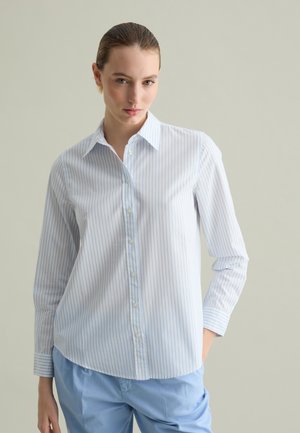 Blusa - white light blue