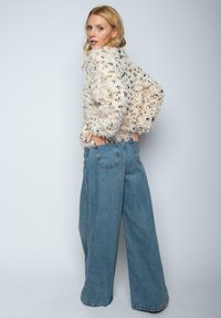 Emily van den Bergh - Kurtka przejściowa