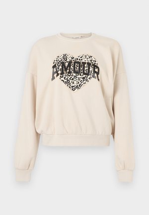 Φούτερ σε κρεμ χρώμα με στρογγυλεμένο τελείωμα και μακριά μανίκια. Διαθέτει σχέδιο καρδιάς με λεοπάρ print και τη λέξη "AMOUR" σε έντονα μαύρα γράμματα.