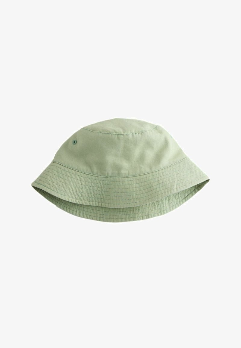 Chapeau seau en coton vert clair avec bord cousu et œillets métalliques pour la ventilation.