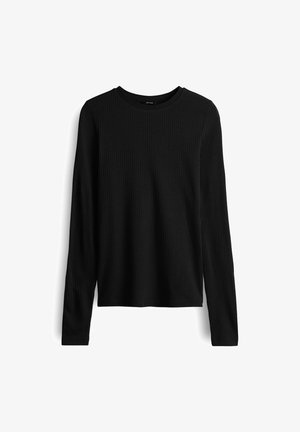 Zwarte geribbelde lange mouw crewneck top met een slim fit en rechte zoom, weergegeven op een witte achtergrond.