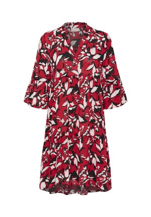 Rød kjole med et blomsterprint og sort-hvide detaljer, v-hals og klokkeærmer, lavet af letvægtsmateriale.