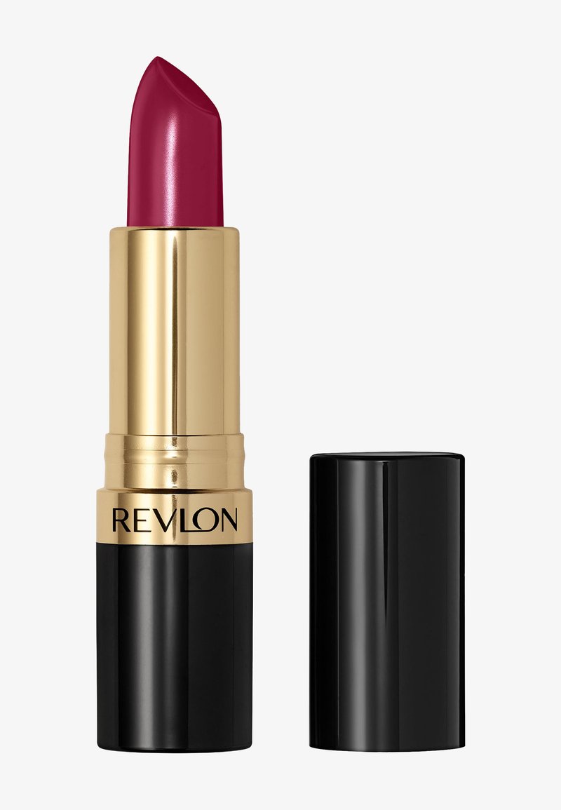 Rouge à lèvres Revlon d'une couleur bourgogne foncé avec une finition brillante. Le bâton est logé dans un tube à vis en or et noir, au design épuré.