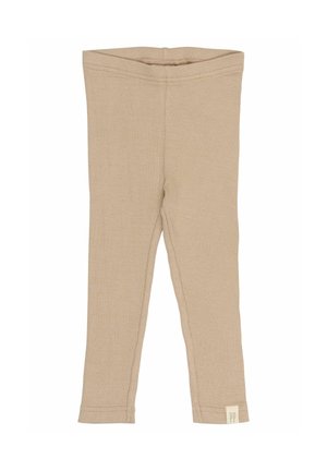 Bež ribane legging z oprijetim dizajnom, mehko teksturo in majhno oznako z "PP" na gležnju. Brez vidnih vzorcev ali dodatkov.