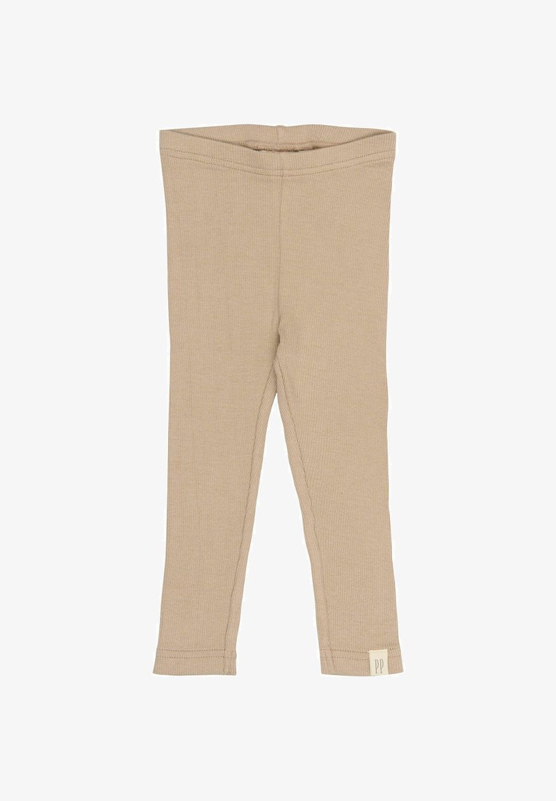 Leggings en jersey beige avec un design ajusté, texture douce et une petite étiquette avec "PP" à la cheville. Pas de motifs ni de matériel visibles.