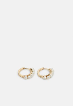 Gold hoop earrings each adorned with five evenly spaced white pearls on a plain light background.