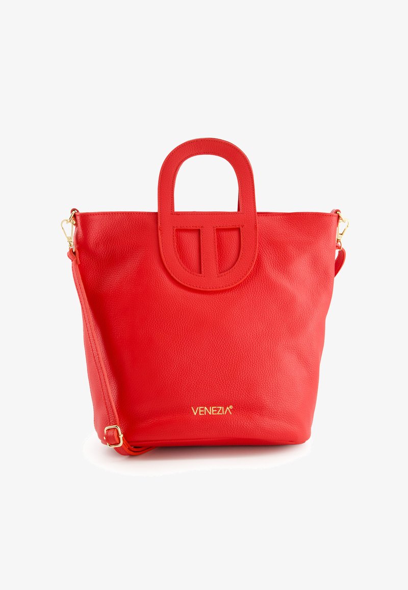 Red leather tote bag with a structured handle and gold branding. Features a textured surface and a detachable shoulder strap.